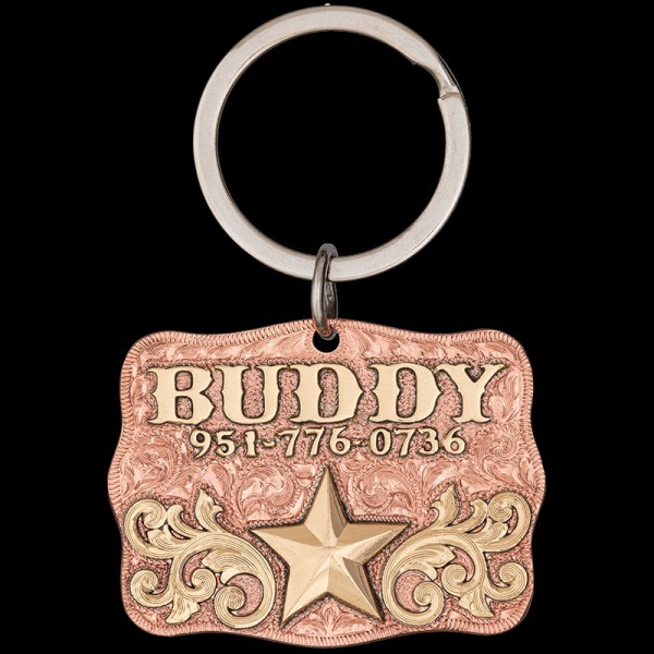 Introducing the Buddy Custom Dog Tag! Crafted on a copper base with stunning jeweler's bronze letters, intricate scrollwork, and a charming star design. Order now!
